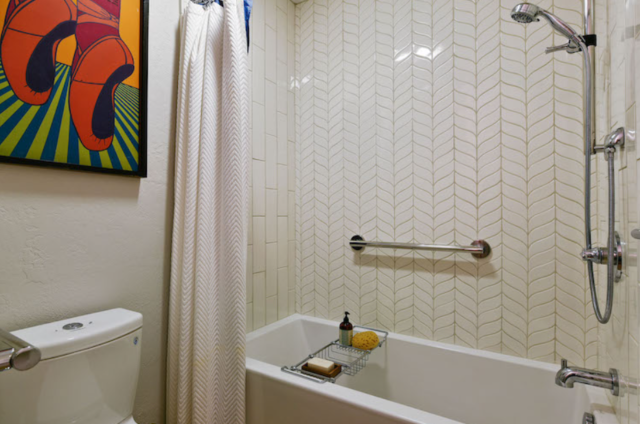 South Vancouver - Complete Home renovation (main bathroom tub and wall tiles standing view)- Refresh Home Renovations