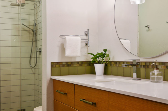 South Vancouver - Complete Home renovation master bathroom sink, mirror, vanity (right side view)- Refresh Home Renovations